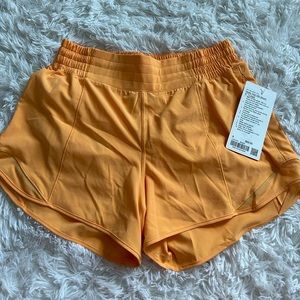 BRAND NEW w/ tags. Hotty Hot LuluLemon shorts, size 8